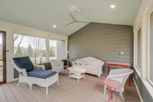 Take advantage of warm days and cool evenings on this screened-in porch, perfectly designed for relaxing in a peaceful, private setting