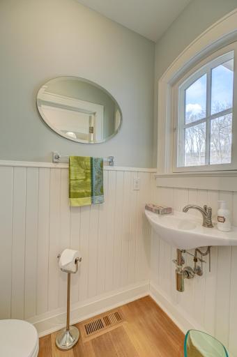 Thoughtfully located, this main-level half bath is perfect for entertaining and guest use