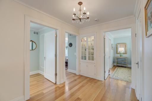 Thoughtfully designed, the upper level includes three generous bedrooms and a primary suite complete with heated bathroom floors for everyday comfort and luxury
