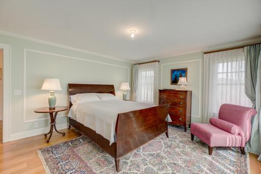 Wake up to sunshine in this bright and inviting third upper-level bedroom