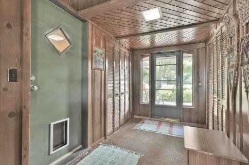 Spacious front foyer to home and attached garage.