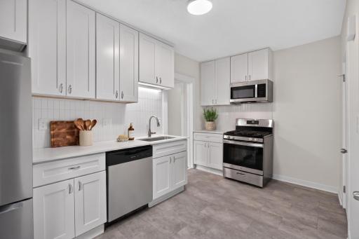 Upper Level Unit - Kitchen - Virtually Staged