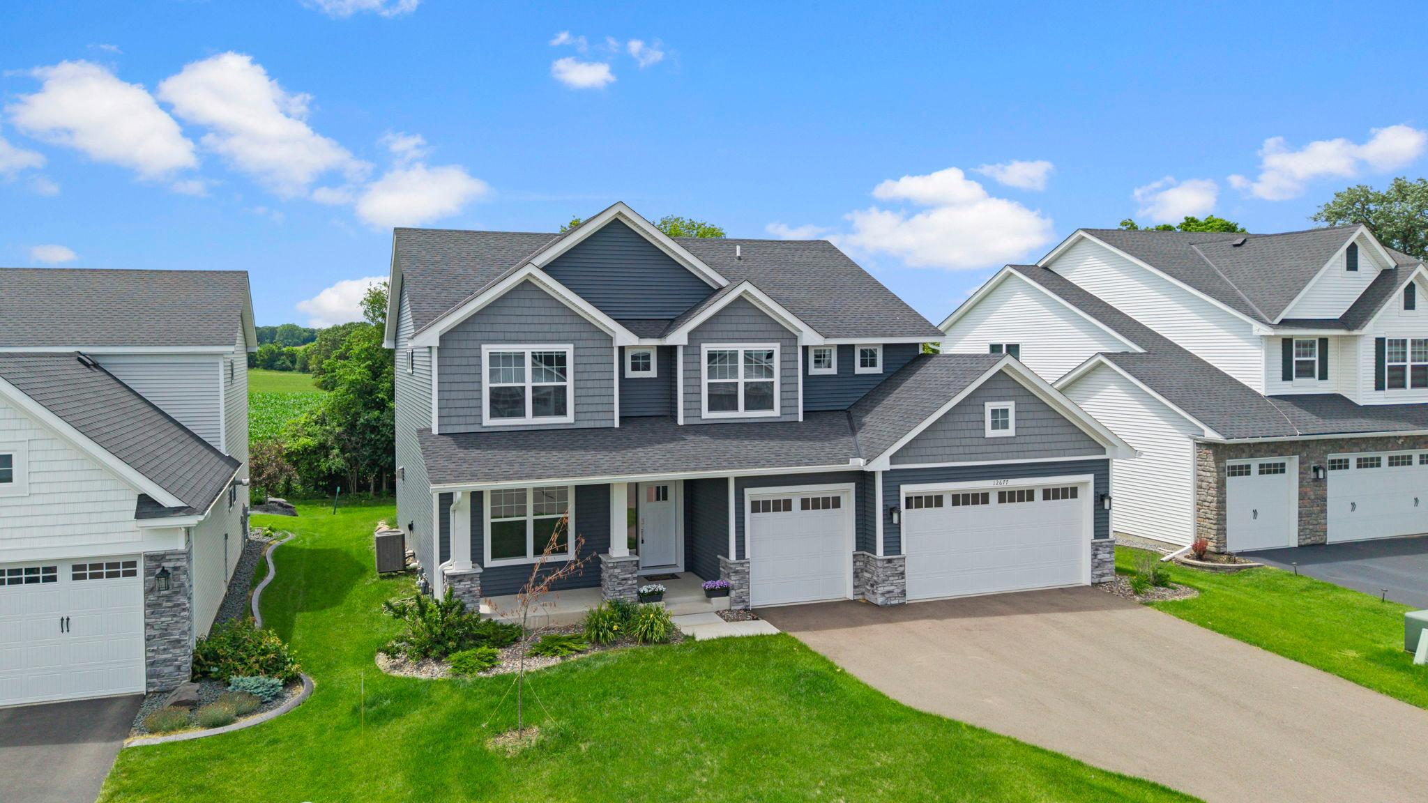 Welcome to this stunning five-bedroom, three-bathroom two-story home, built in 2023 and nestled in the desirable Meadow Ridge neighborhood of Rosemount.