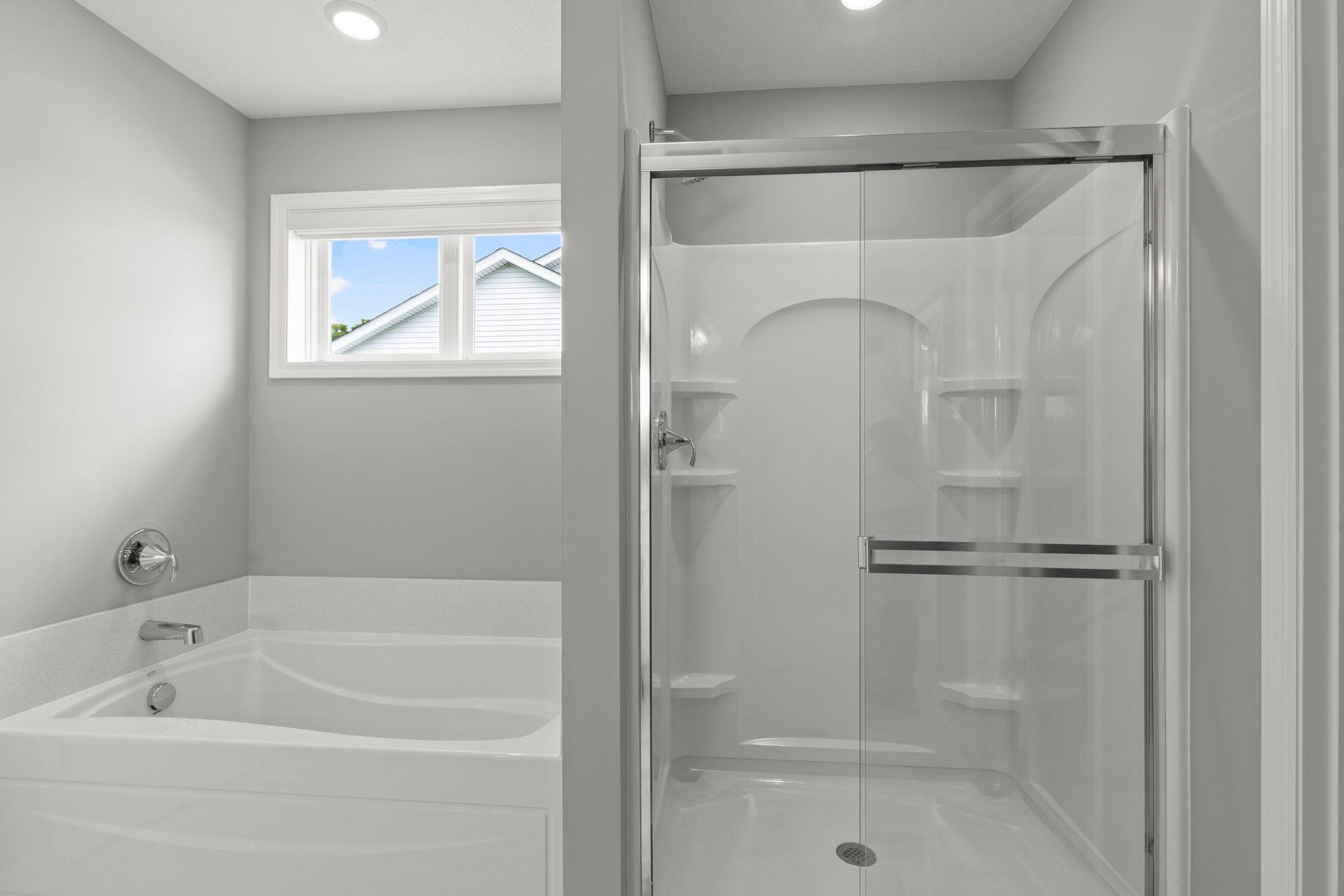 Separate tub and shower.