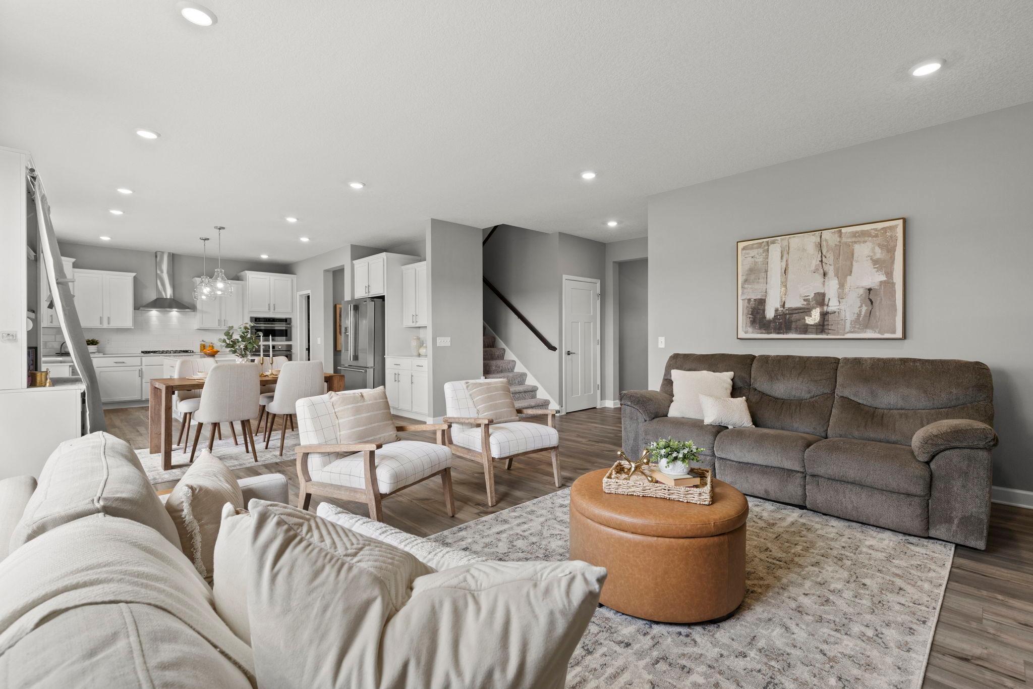 The open-concept main level offers a seamless flow of living spaces.