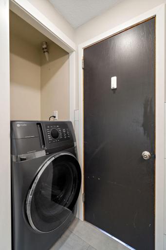 Washer/ Dryer combo in main level bathroom