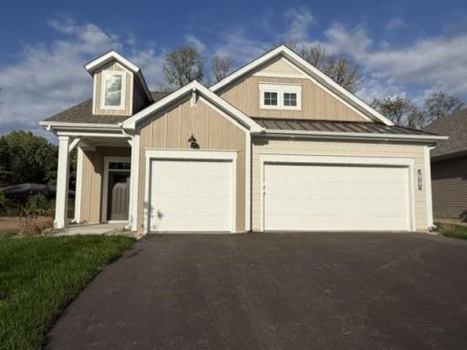 Welcome to main level living with our Magnolia floorplan! This is a 2-story, association maintained patio villa with all living facilities on the main level, plus 2 additional bedrooms, a bathroom, large loft, and finished storage area upstairs.