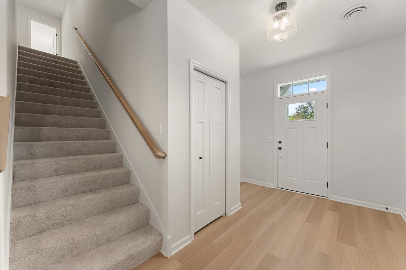 Foyer and stairs to upper level