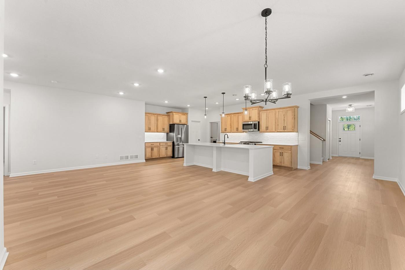 Tons of space in the family room plus wide hallways make the home feel extra spacious.