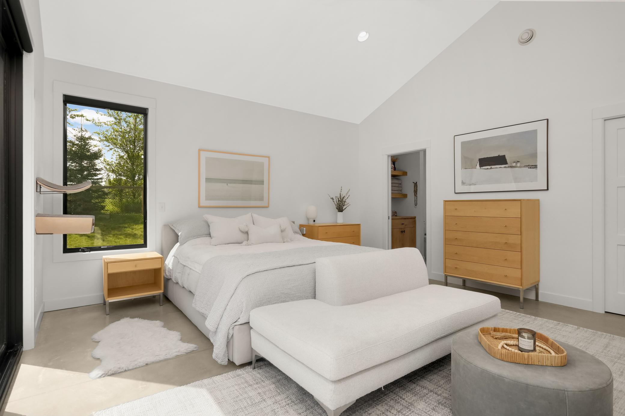 Your primary oasis with vaulted ceiling and walls of windows