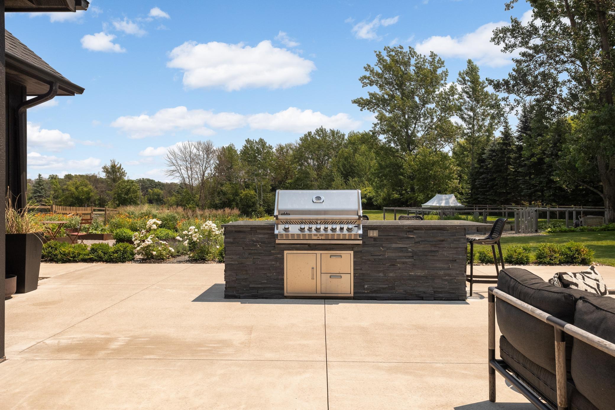 Built in island with Napoleon Grill and bar seating
