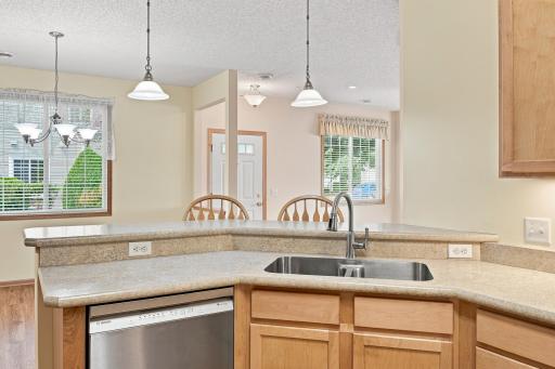 Maple Cabinets, Bosch Dishwasher (2025) & Pendant Lighting