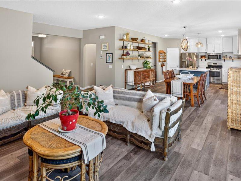 Great view standing in the living room into the kitchen and dining area