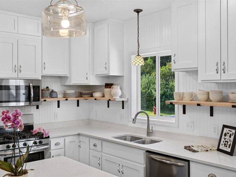 Ceiling height cabinets with added bead board finishes