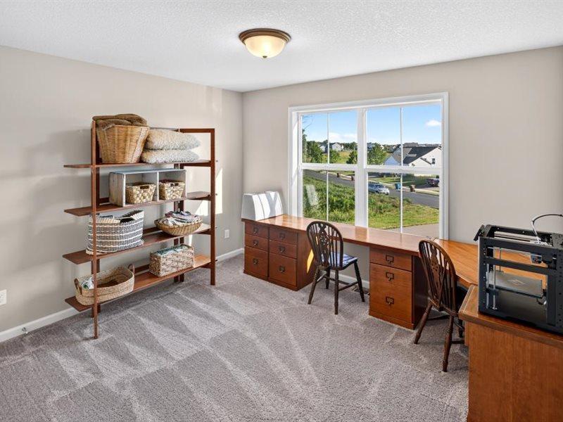 One of the four bedrooms located on the upper level