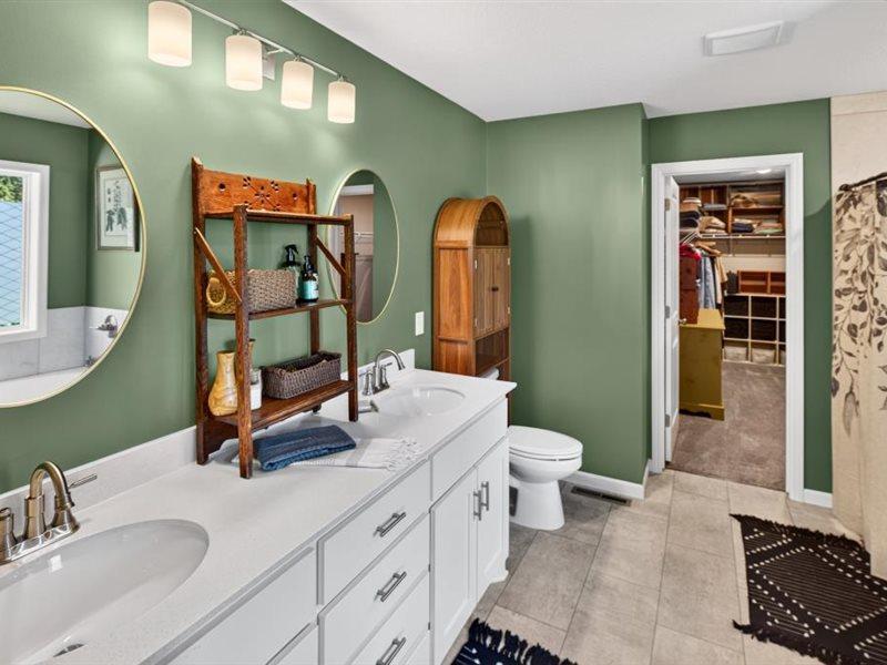 Master bathroom with double sinks and quartz counter tops