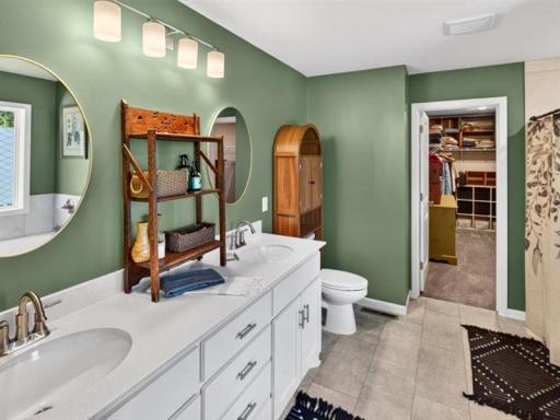 Master bathroom with double sinks and quartz counter tops