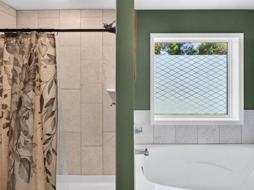 Seperate soaking tub and tiled shower