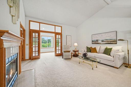 Living Room with french doors that lead to the sun room.