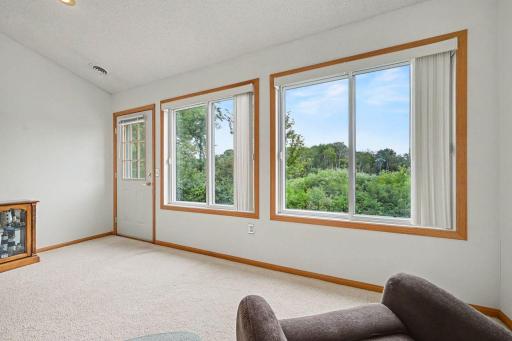 Sunroom with large windows to enjoy the view all year long.