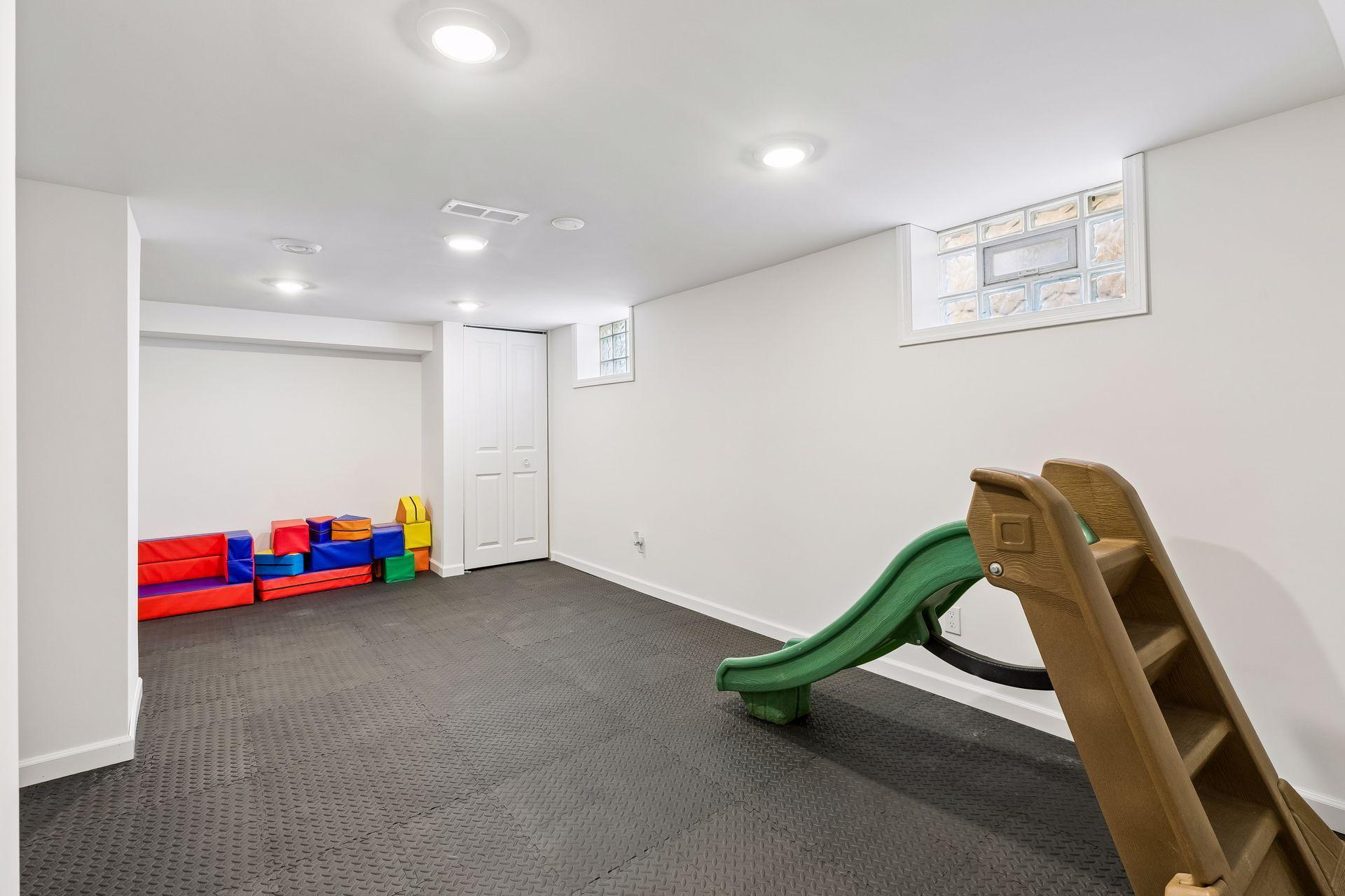 Newly finished basement provides the perfect space for a family room, rec room, playroom, or home gym