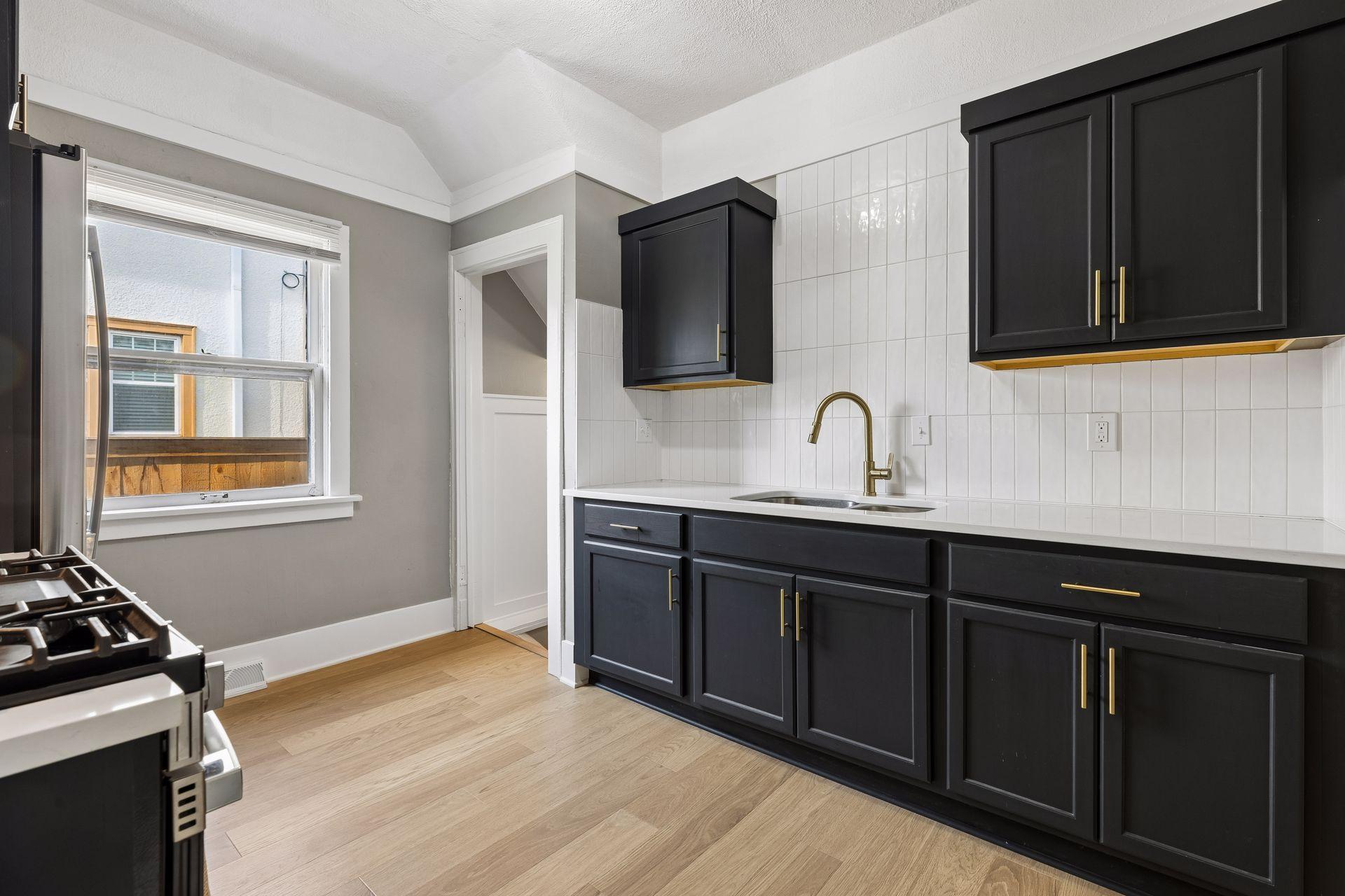 Full kitchen remodel included quartz countertops and custom cabinetry