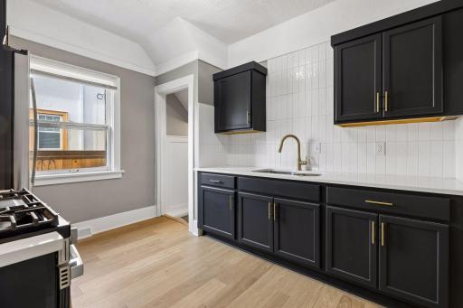 Full kitchen remodel included quartz countertops and custom cabinetry