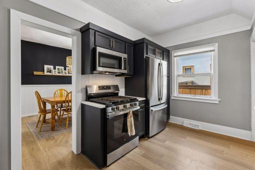 Easy access to the beautifully renovated kitchen from the dining room