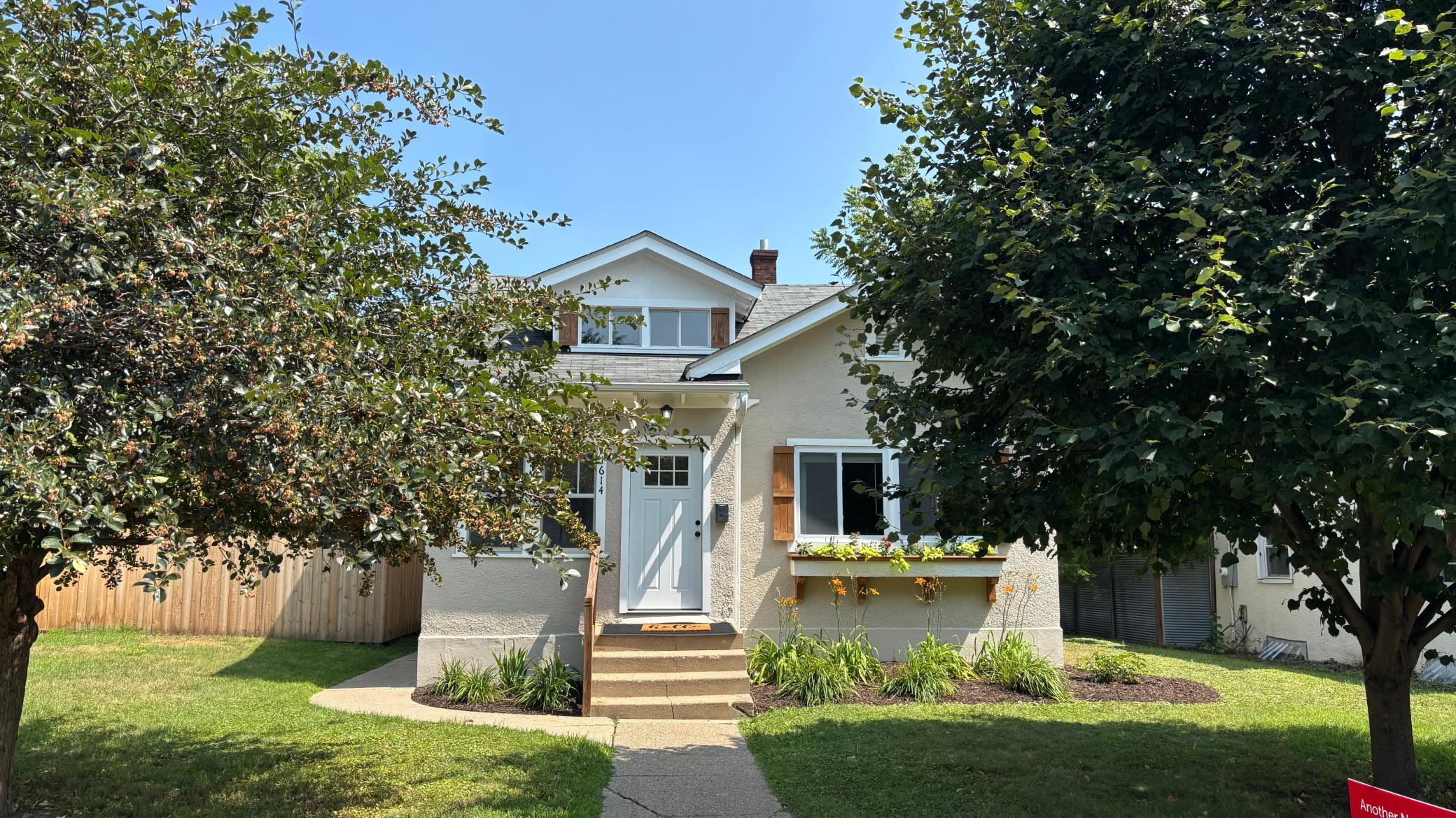 Charming 1 1/2 story with tons of curb appeal!.jpeg