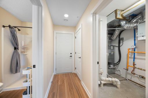 Entrance from garage = 3/4 bath to the left and utility room to the right