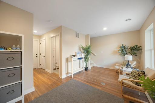 Main floor flex room - the two car garage is accessed through the closed door.