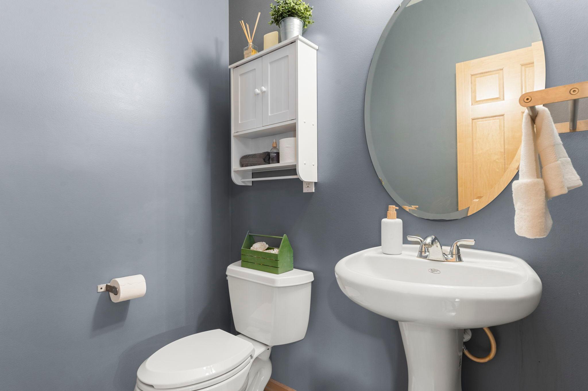 A convenient main level half bathroom.