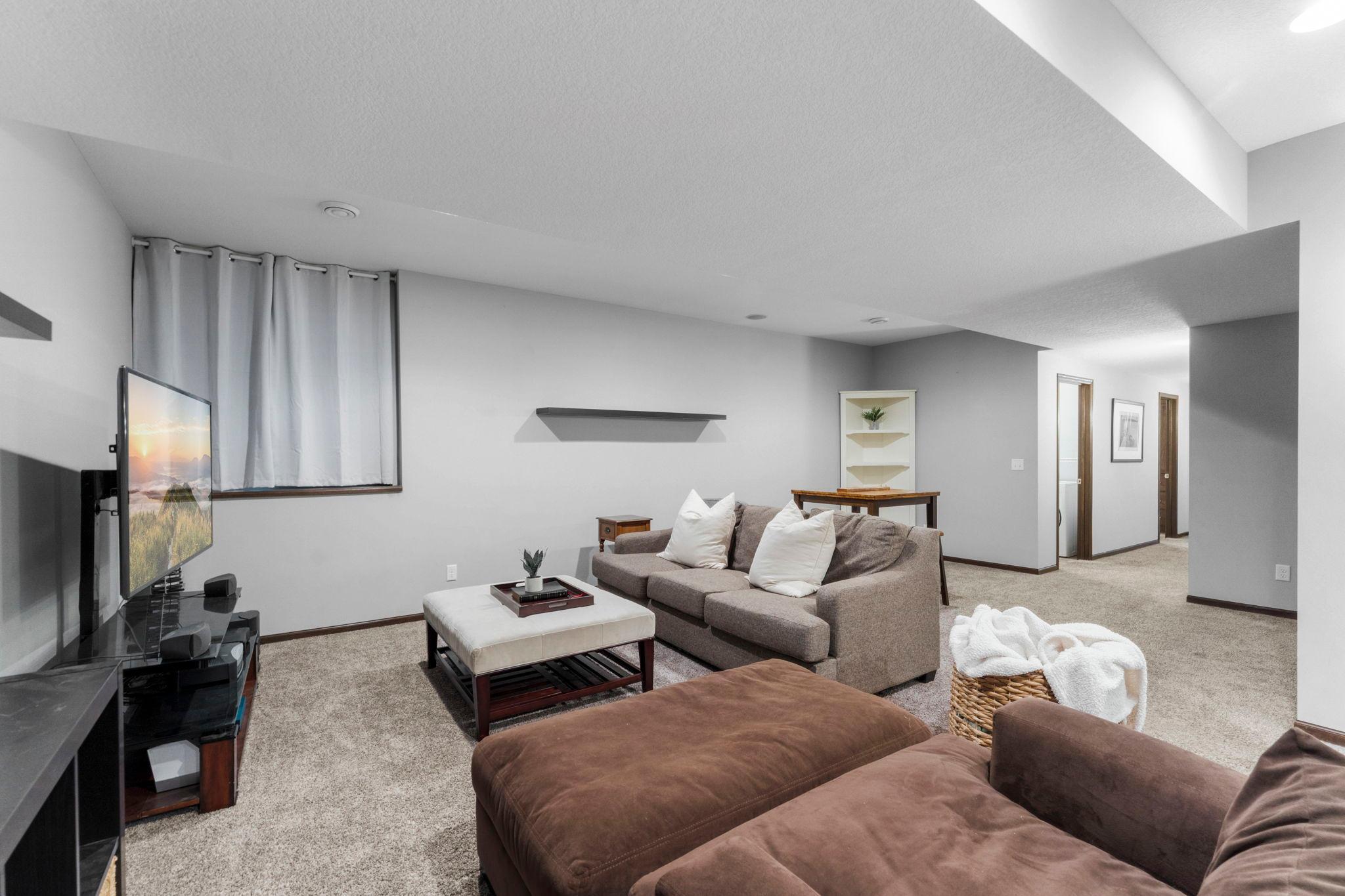 A different angle of the lower-level family room.