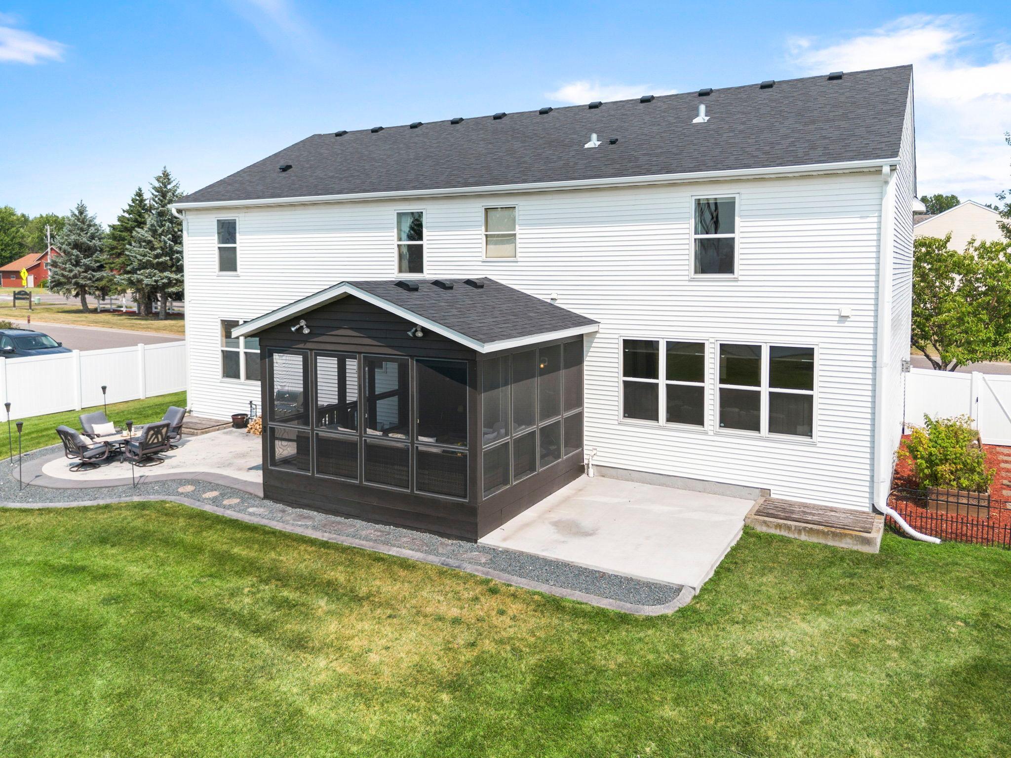 Excellent curb appeal featuring newer siding and roof, fresh exterior power washing, and concrete edging around the home.