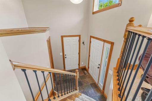 Bright entry with a convenient closet and entrance from the attached garage.
