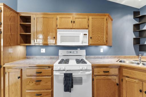 All white appliances create a clean, cohesive look that is easy to maintain.