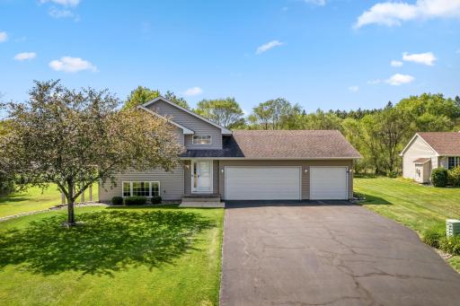 Welcome to 6180 145th Lane in Ramsey, an inviting home with an oversized yard and plenty of outdoor space to enjoy.