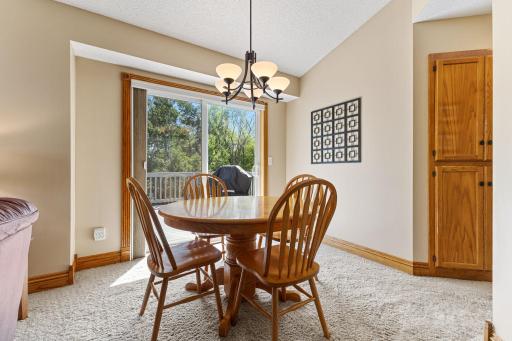 Informal dining area with convenient access to the deck.