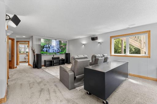 The family room provides plenty of space for movie nights, entertaining or everyday relaxation.
