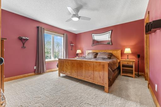 Comfortable primary bedroom with generous space and abundant natural light.