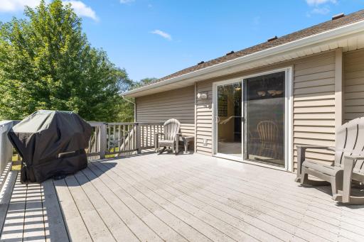 Step outside to the large deck, perfect for grilling, relaxing and enjoying the backyard.