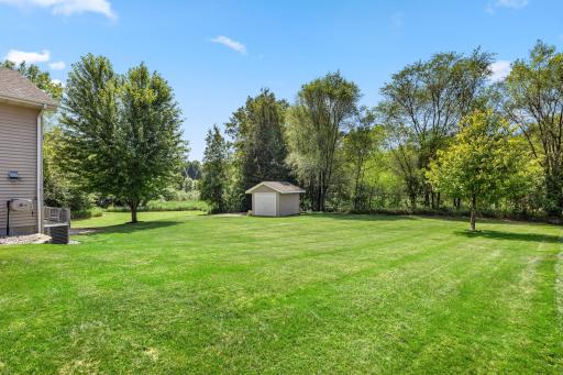 Beautiful open lawn provides endless possibilities for recreation, gardening and outdoor enjoyment.