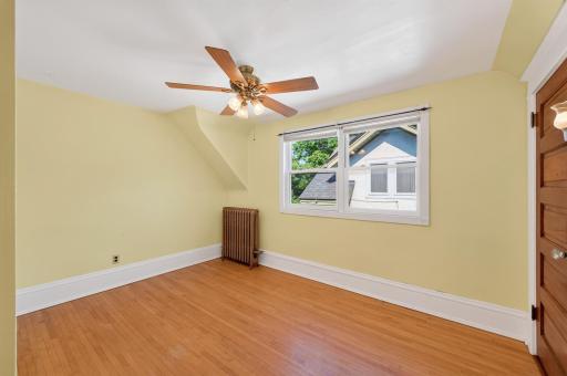 Upper level bedroom two - A bright and cheery space - Great size with a spacious closet