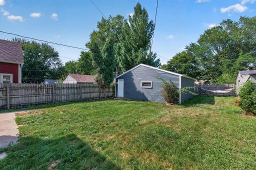 Fenced in backyard - A nice size for games and entertaining.