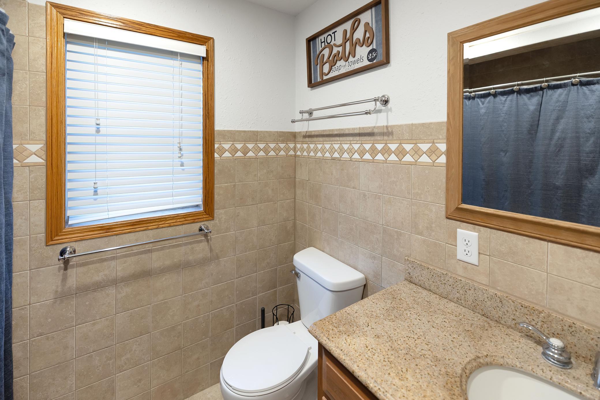 Full bathroom with detailed tile work