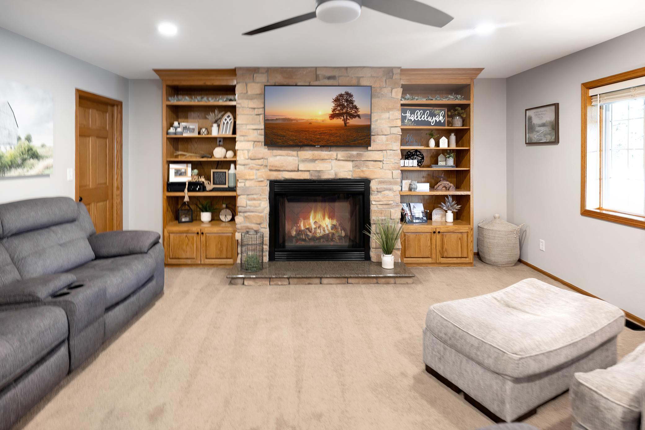Nothing says cozy like a fireplace with built-in shelving
