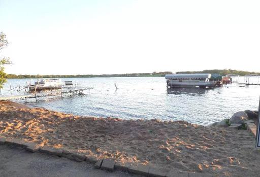 Small sandy swimming beach is ample and lots of fun for all!