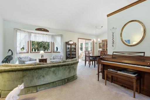 Coming up the stairway there is the bright and spacious living room.