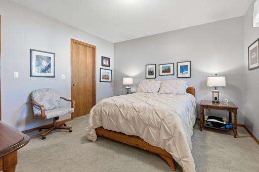 The upper level bathroom is a walk-thru with the primary bedroom.