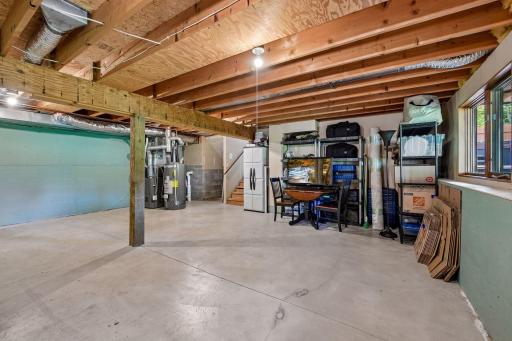 Dream a bit with maxing out your storage needs or to refinish this level as a flex space, home gym, office and more!